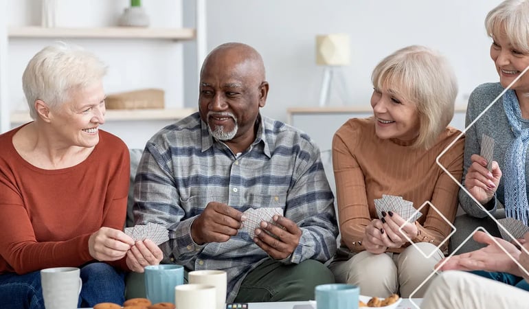 elderly playing cards