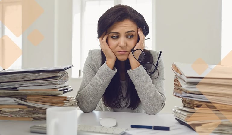 Frustrated senior living admin at the amount of paperwork from her communities move-in process