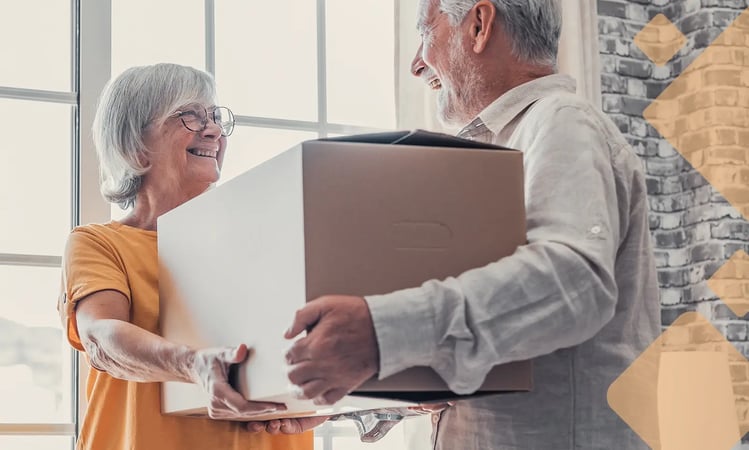 elderly couple excited to move in to assisted living community using assisted living move-in software