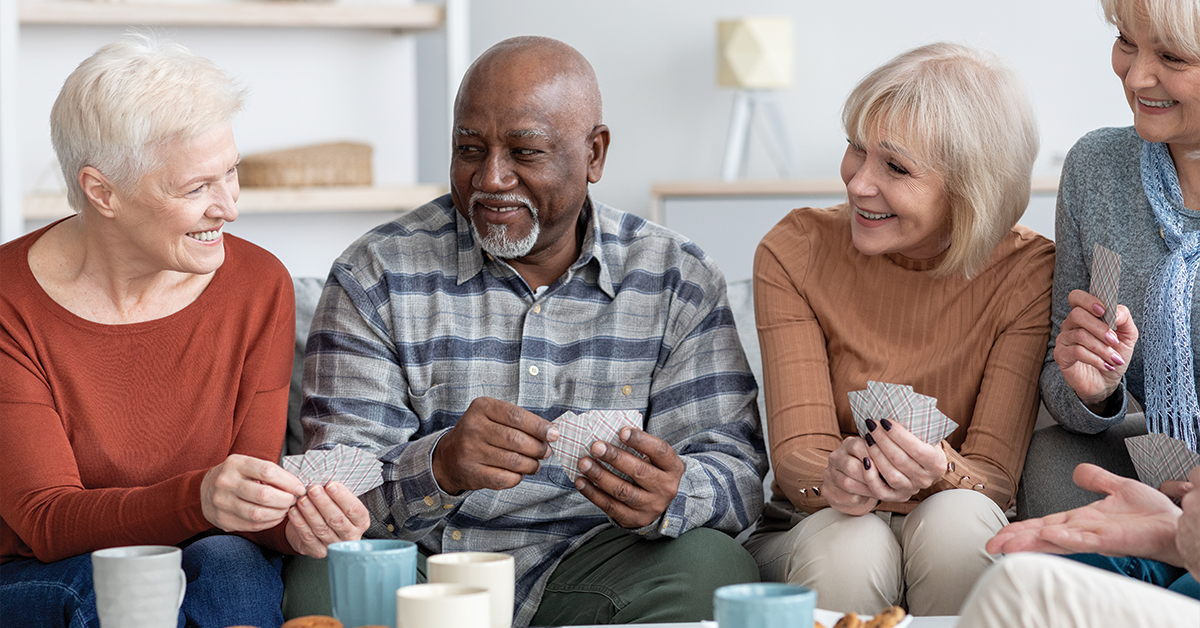 elderly playing cards