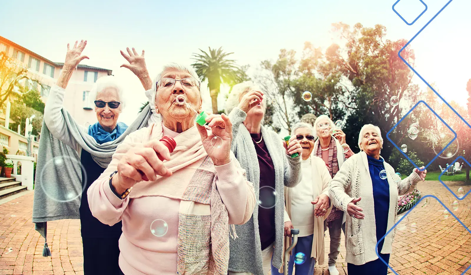elderly blowing bubbles - top assisted living software 2025